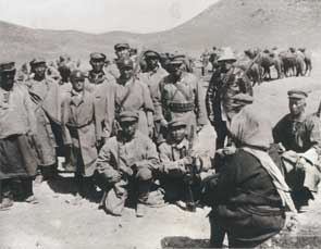 Expedition participants (from the right)  
K. Ryabinin, Y. Roerich, L. and I. Bogdanovs. At the foreground, from the back – H. Roerich. 1927