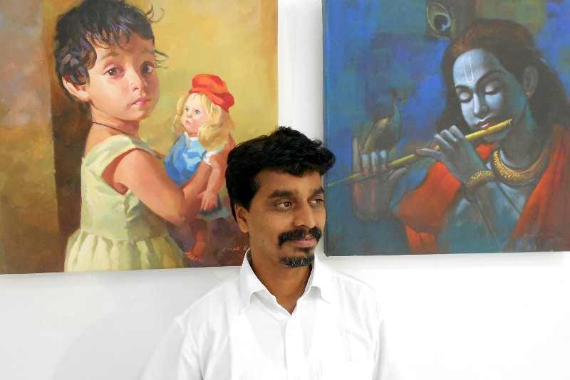 Raman Lohar and some of his works including his daughter's portrait